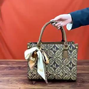 Real leather texture womens large capacity mom versatile fashion European and American womens bag