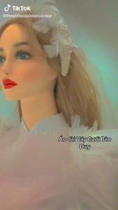 Áo dài lụa tay phồng lông vũ trắng siêu xinh