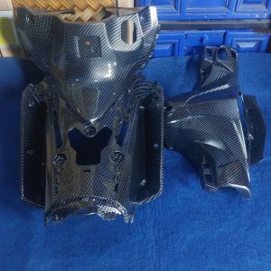 BATOK BELAKANG DAN LEGSHILD TENGAH KONTAK SUPRA 125 F1 INJEKSI KARBON