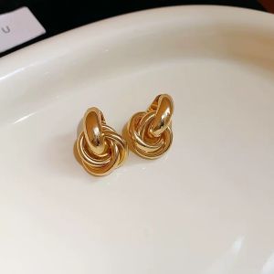 Korean-style twisted thread earrings simple and versatile niche high-end design non-fading popular silver needle earrings 2026