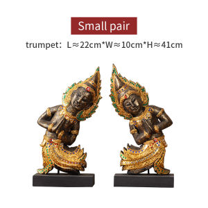 พระพุทธรูปทรงเป็นเหมือนของตกแต่งห้องรับประทานอาหารในเอเชียตะวันออกเฉียงใต้ พระพุทธรูปประดับโต๊ะโรงแรม สำนักงาน