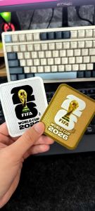 Patch Nhung Tay Áo World Cup 2026 Chuẩn Thi Đấu Patch Ép Nhiệt Bóng Đá Cao Cấp Chống Nhiễm Màu