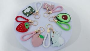 เคสป้องกันพวงกุญแจหนัง เข้ากันได้กับ AirTag ที่จับติดตาม GPS Air Tag พร้อมพวงกุญแจเชือกถัก อุปกรณ์เสริมเคส Airtag ป้องกันรอยขีดข่วนสำหรับกุญแจกระเป๋าเป้