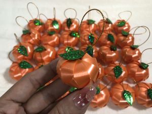 เหรียญโปรยทานลูกส้ม (ตัวเปล่าไม่ได้ใส่เหรียญ) แพ็ก 50 ชิ้น มีกระพรวนแถมให้