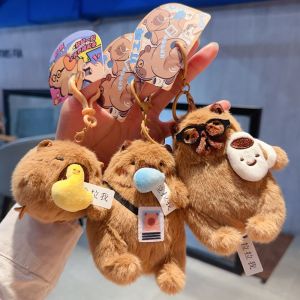 XZCXC รูปการ์ตูนสัตว์ ตุ๊กตาคาปิบาราพวงกุญแจ หางกระดิก ตุ๊กตาฟูฟ่อง จี้ห้อยกระเป๋า สร้างสรรค์ น่ารัก ห่วงกุญแจรถ ของตกแต่งกระเป๋าเรียน