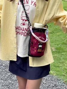 Cute cartoon water bottle crossbody bag for female students ins New dopamine-style woven strap shoulder bag for mobile phones