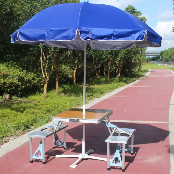 Outdoor tables and chairs with umbrellas set advertising exhibition ...
