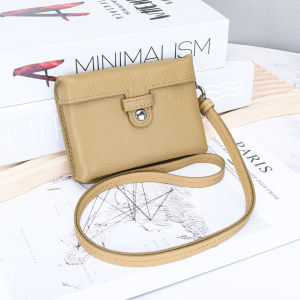 Ladies Halter Style Mini Cowhide Multifunctional Bag Simple Design Suitable for Storage Headphones Change and Keys
