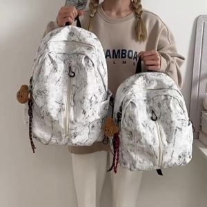 Korean-style foreign trade backpack for middle and high school students and college students large-capacity school bag for men and women couples tie-dye printed travel backpack