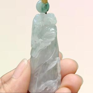 A Bamboo with Pixiu Crafted on Light Green Hue with Light Lavender Natural Type A Burmese Jadeite Jewellery certificate weighs 23.91 grams measurement 50.3 * 20.6 * 12.8 mm (pendant 318)