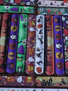 Pack of 100 Halloween Celebration Slap Bracelets Assorted Halloween Slap Wristbands Charm for Party Atmosphere