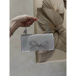 Túi xách nữ cầm tay đeo chéo Đính nơ kim tuyến khoá xoay sang chảnh phong cách trẻ trung 2024.