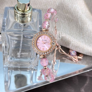 นาฬิกาไข่มุกหรูหราน้ำหนักเบาสำหรับผู้หญิงสายปรับได้ฝังพลอยเทียมฟรีนาฬิกาลำลองผู้หญิง Fashion Jam Tangan