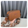 GUESS women's bag new crossbody bag 2024 European and American fashion letter camera bag shoulder strap versatile single shoulder small square bag. 