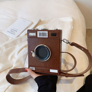 323กระเป๋าสะพายข้างทรงกล่องสี่เหลี่ยมเล็กแบบอเนกประสงค์สำหรับผู้หญิง ดีไซน์เฉพาะตัว กระเป๋าถือรูปกล้อง INS แฟชั่นใหม่ ปี 2025