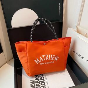 EchoBliss ใหม่ตัวอักษรที่เรียบง่ายความจุขนาดใหญ่กระเป๋าโท้ทออกแบบหัวเข็มขัดแม่เหล็กแฟชั่นเดินทางท่องเที่ยวกระเป๋าแมทช์ง่าย