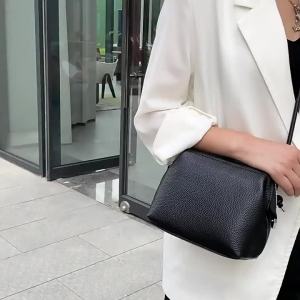 Túi xách nữ da thật thời trang nhẹ nhàng túi đeo vai túi đeo chéo da bò lớp đầu túi vỏ sò bán sỉ xuyên biên giới.
