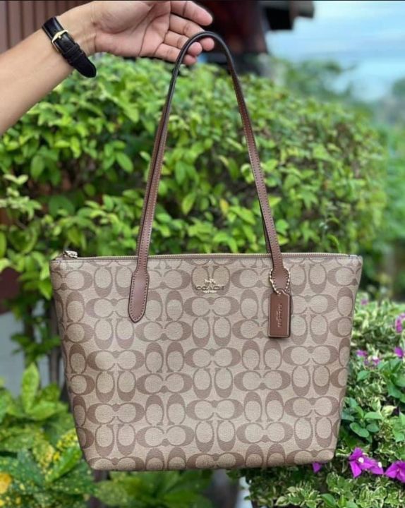 Coach zip top cheap tote in signature canvas