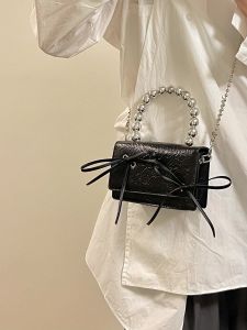 Unique designer handbag for women crossbodychain bag with black and white bow 2026 New cross-body headphone bag