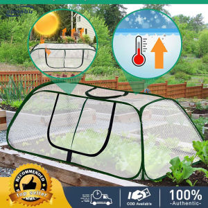 Portable plant greenhouse with a removable zipped door ideal for growing vegetables and flowers outdoors