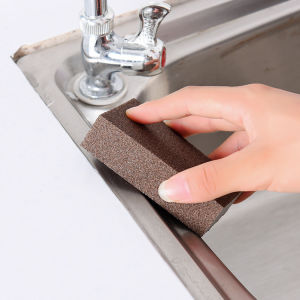 Abrasive sponge for cleaning and removing stains cleaning black grime from the bottom of pots and pans and removing rust.