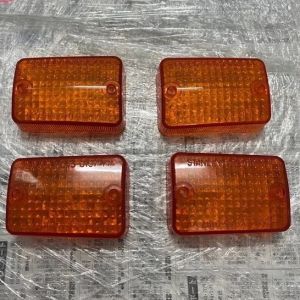 BỘ NẮP XI NHAN XE CUB 82 LOẠI DẦY 4 CÁI