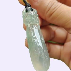 Crafted as Mystic Beast Pendant on High Quality Natural Type A Jadeite Jade certificate weighs 9.38 grams measurement 48.8 * 12.7 * 8.8 mm (pendant371)