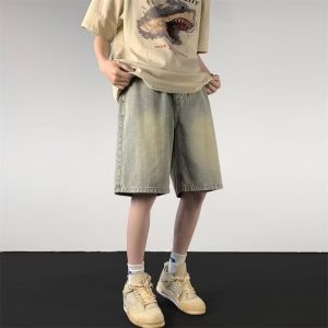 《501》 ขาสั้นยีนส์วินเทจฟอกสำหรับผู้ชาย กางเกงขาสี่ส่วนหลวมฤดูร้อน สไตล์อเมริกันไฮสตรีท กางเกงขาสั้นกลางยาวสบายๆ