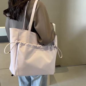 Túi tote nữ mẫu mới túi đeo vai đi làm túi xách tay đi học cho sinh viên túi vải nylon dây rút đơn giản dung tích lớn.