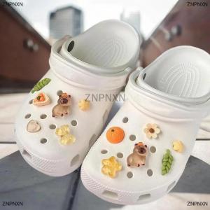 [COD] ZNPNXN 12ชิ้นรูรองเท้าดอกไม้ตกแต่งบีเวอร์รูหัวเข็มขัด DIY capybara เรซิ่นอุปกรณ์เสริมความรู้สึกไฮเอนด์