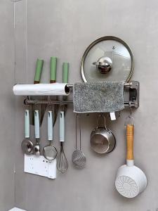 SXH No-drill holder and storage rack 304 Stainless steel storage rack kitchen hooks pot lid holder cutting board holder and paper towel dispenser