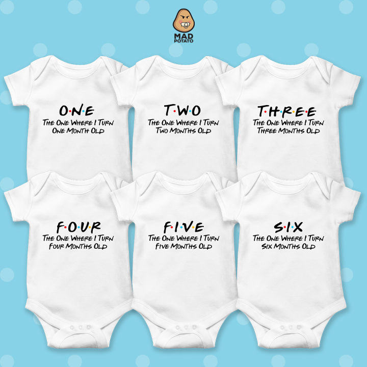 Orders milestone onesies for boy