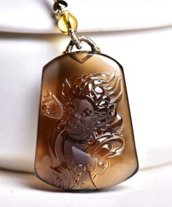 Pure natural tea topaz big black heaven God of wealth pendant super beautiful color exquisite carving. The guardian God is the god of medicine and wealth. Bless peace and health! Dimensions: 403014 mm
