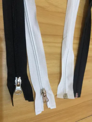Resleting jaket nilon MRT 70 cm hitam dan putih isi 12 pcs