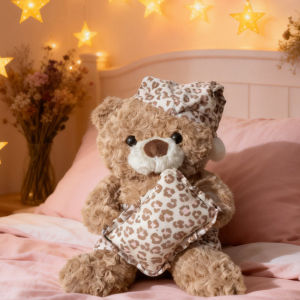 Cute plush bear doll in a blue plaid pajama perfect as a cuddly pillow a gift for girls