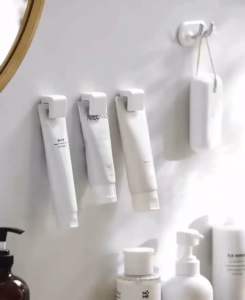 Toothpaste Holder Rack Punch-Free Wall-Mounted Face Cleanser Bathroom Wall Storage Clip