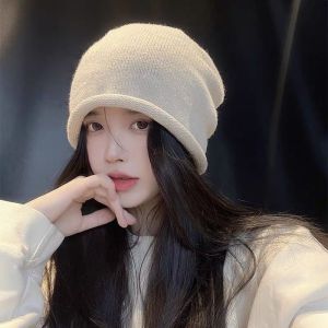 หมวกบีนนี่ถุงอ้วนแบบผูกเชือกแฟชั่นสำหรับผู้หญิงหมวกหมวกสีทึบกะโหลกศีรษะอุ่นมีหูสำหรับฤดูใบไม้ร่วงและฤดูหนาวหมวกขนสัตว์ถักสำหรับเด็กผู้หญิง