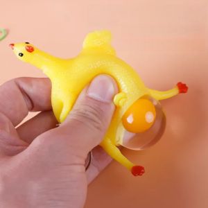 Creative Vomit Gudetama Toy Funny Prank Egg Yolk Bun Stress Relief Squeeze Chicken Soft Rubber Elastic Toy Keychain Egg Laying Chicken Slingshot Chick Sticky Wall Toy