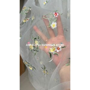 Vải voan kính (SLx0.5m khổ 0.5m) thêu hoa chân bông hai đầu.