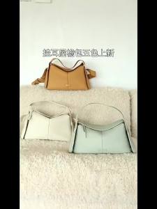 Classic Retro Leather handbag with eaves design Songmont ear hanging crossbody bag women