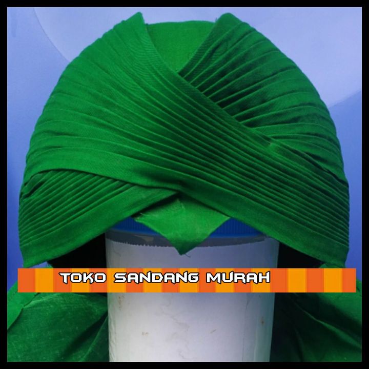 Blangkon%20Jogja%20lipat%20Hijau%20Polos%20Sliwir%20HALUS%20/Adat%20Jawa%20/Pakaian%20Tradisional%20/Surjan%20Lurik%20-%20Image%206