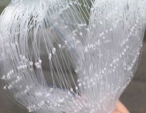 ตาข่ายกันนกเอ็นใส  ป้องกันนก ชนิดถักเส้นเดียว มีความโปร่งแสงสูง ทนแดดทนฝน สีใสเหมือนแก้วไม่แข็งกระด้าง ทนทาน ทนความร้อน