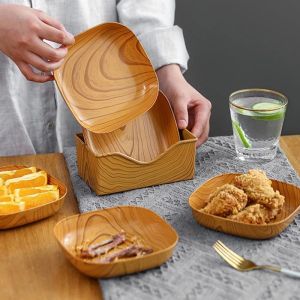 Creative Japanese imitation wood grain plastic bone spit plate snack plate fruit plate nut snack plate table storage