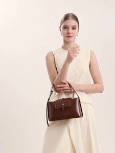 Da thật nữ 2026 Túi xách tay đeo vai kẹp nách mẫu mới mùa đông thiết kế độc đáo phong cách công sở đơn giản thanh lịch dễ phối đồ.