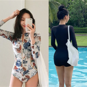 ชุดว่ายน้ำเล่นกระดานโต้คลื่นแบบมีซิปด้านหน้าของผู้หญิงชุดว่ายน้ำฝึกแขนยาวชุดว่ายน้ำนักกีฬา