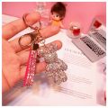 New Cute Bling Rhinestone Cartoon Gloomy Bear Keychain With Strap KAWS Keychain Keyring  Key Ring Chain Doll Pendant Pendant New Rhinestone Violent Bear Keychain Ins Cute Gift Toys Violent Bear Kaws Keychain. 