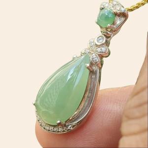 Apple Green Quality Translucent Drop Shape Cabochon on Natural Type A Jadeite Jade set on S925 as pendant certificate weighs 3.12 grams measurement 16.3 * 9.2 *4 mm (s925p3)