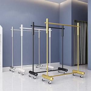 FFBH Standing Clothes Hanger Luxury Nordic Coat Racks Movable Metal Bedroom Clothing Rack with Wheels Modern Living Room Furniture P9M4Y
