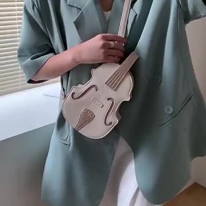 Miễn Phí Vận Chuyển 2022 Ba lô nữ mới túi xách đa năng và thời trang túi đeo chéo hình đàn violin hợp xu hướng.