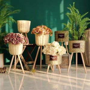 [SG THEJOYLAND] Rattan Basket with Leg Natural Woven Planter Pot Indoor Basket Home Decor Artificial Plant Basket Wooden Stand Decorative Planter Basket with Legs Corn Husk Rattan Pot for Living Room Bedroom Balcony Office Artificial Tree Flower Pot Home